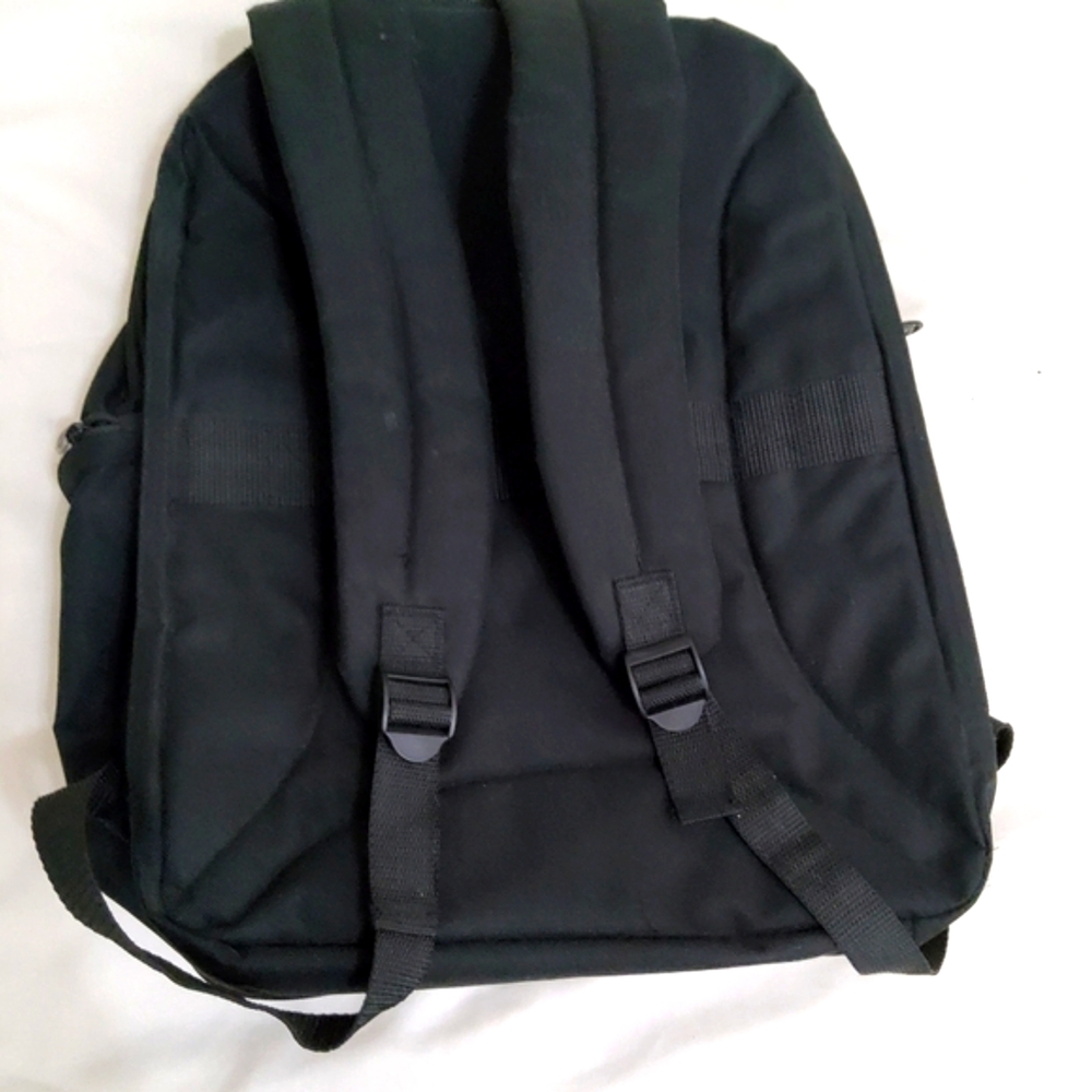 Backpack Checkmate Computer Friendly bag, 17" x 6" x 10" wide straps, pockets